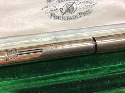 Lot 730 - Early 20th century 9ct gold Waterman's fountain pen with a 9ct gold mounted body, hallmarked London 1917, in original velvet lined tooled green leather box