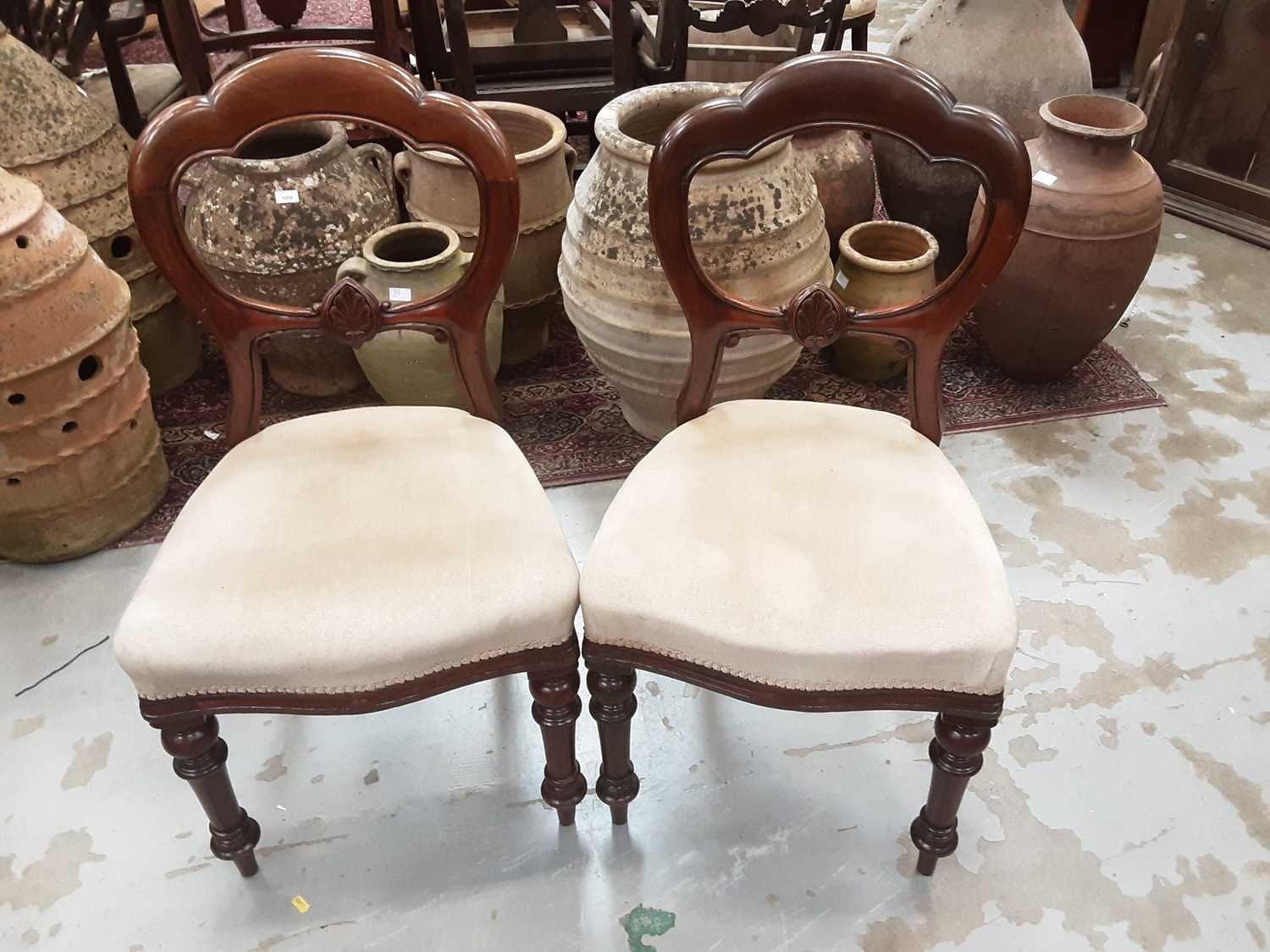 Lot 868 - Set of four Victorian mahogany dining chairs with upholstered seats on turned front legs