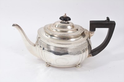 Lot 204 - George III silver teapot, bright cut decoration