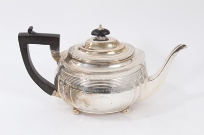 Lot 204 - George III silver teapot, bright cut decoration