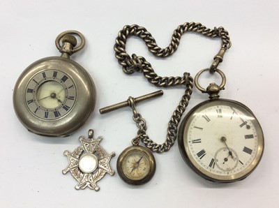 Lot 747 - Silver cased pocket watch on silver chain with compass fob, one other silver cased half hunter pocket watch and a silver fob