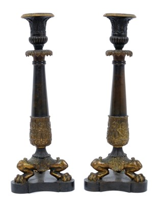 Lot 787 - Good pair of Regency bronze and ormolu candlesticks