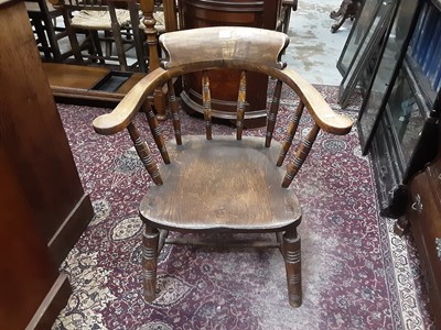 Lot 1032 - Antique beech and elm captains tub chair