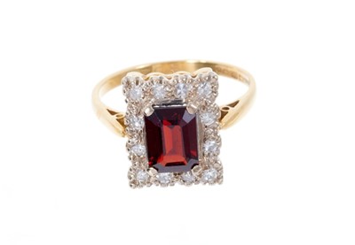 Lot 550 - Garnet and diamond cluster ring with a rectangular step cut garnet surrounded by a border of single cut diamonds, on 18ct yellow gold shank