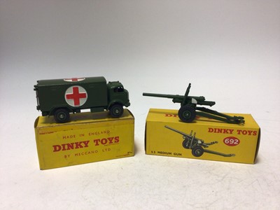 Lot 2160 - Dinky Military Ambulance No 626, 5.5 Medium Gun No 692, Armoured Car No 670, Austin Champ No 674, all boxed (4)