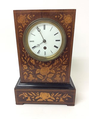 Lot 660 - Late 19th century French mantel clock in floral marquetry rosewood case, key and pendulum present, 32cm high