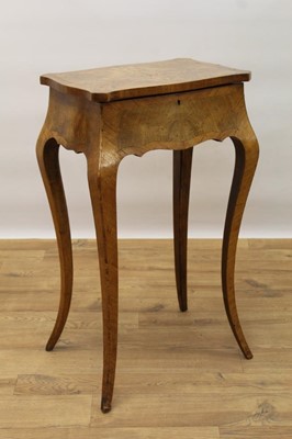 Lot 1454 - Victorian walnut teapoy, shaped rectangular form, the quarter-veneered crossbanded top higher to reveal mixing bowl and flanking hinged canisters, raised on cabriole legs, 43cm wide