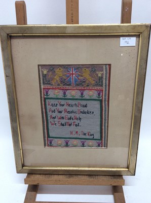 Lot 192 - Two 1930s Royal commemorative samplers depicting Buckingham Palace, flags and verse, each in glazed gilt frames, overall size 44cm x 38cm