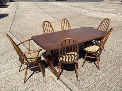 Lot 954 - Ercol dining table and six chairs