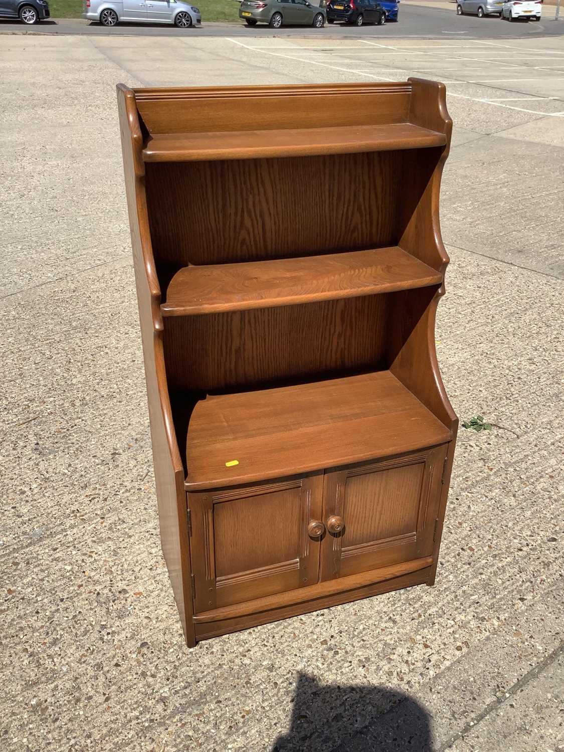 Lot 949 - Ercol bookcase