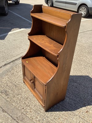 Lot 949 - Ercol bookcase