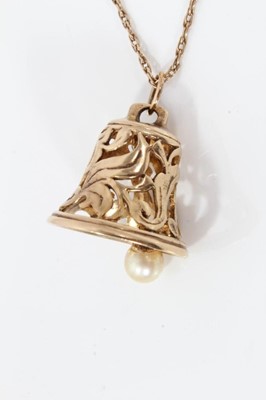 Lot 582 - 9ct gold ‘bell’ pendant on chain