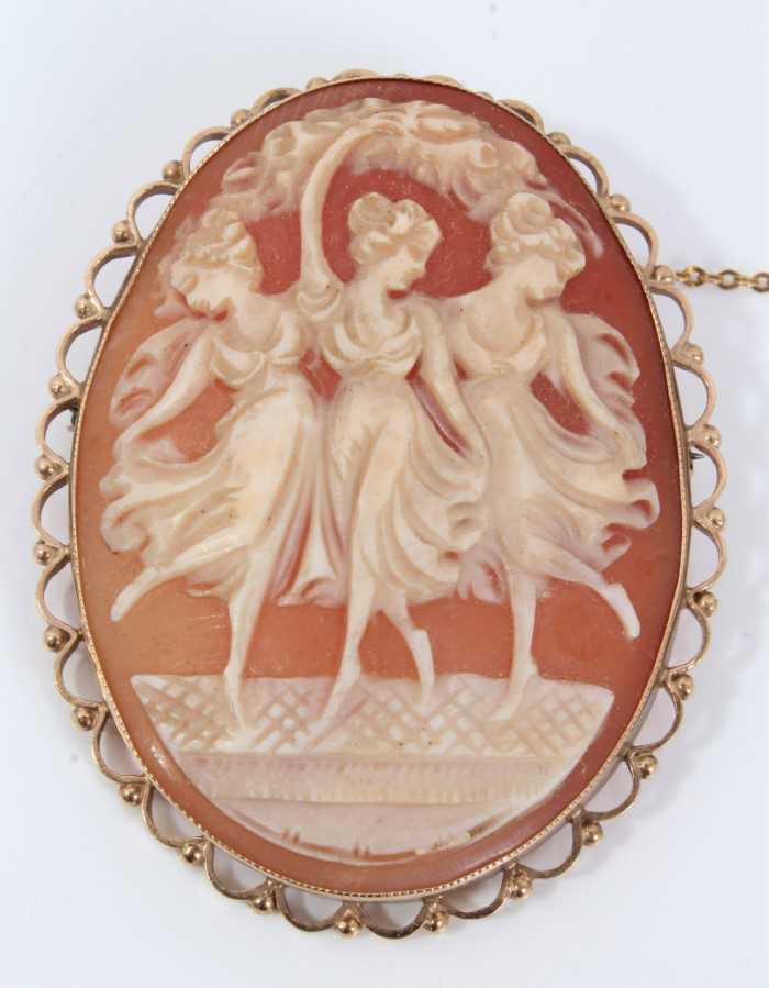 Lot 583 - Carved shell cameo brooch depicting the Three Graces, in 9ct gold mount