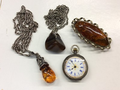 Lot 725 - Amber brooch, amber pendant, silver fob watch and agate pendant on chain