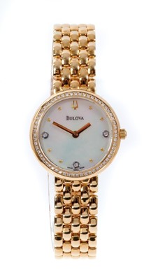 Lot 600 - Ladies 18ct gold Bulova wristwatch