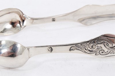Lot 236 - 11 Victorian silver Old English Shell pattern teaspoons (London 1893) and two pairs sugar tongs