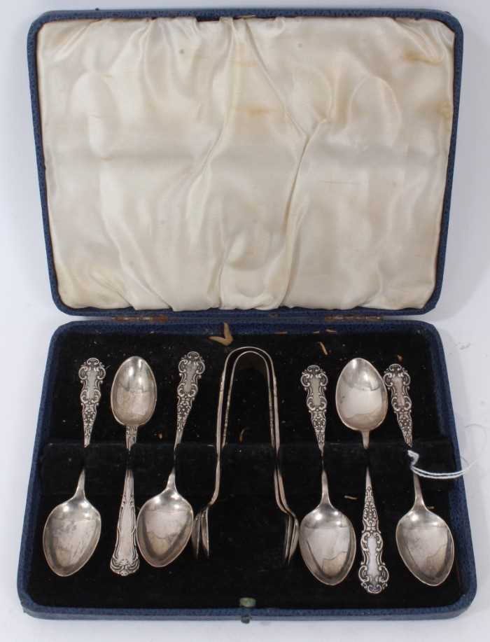Lot 239 - Composite set of six George V silver teaspoons, with two pairs sugar tongs in a fitted case