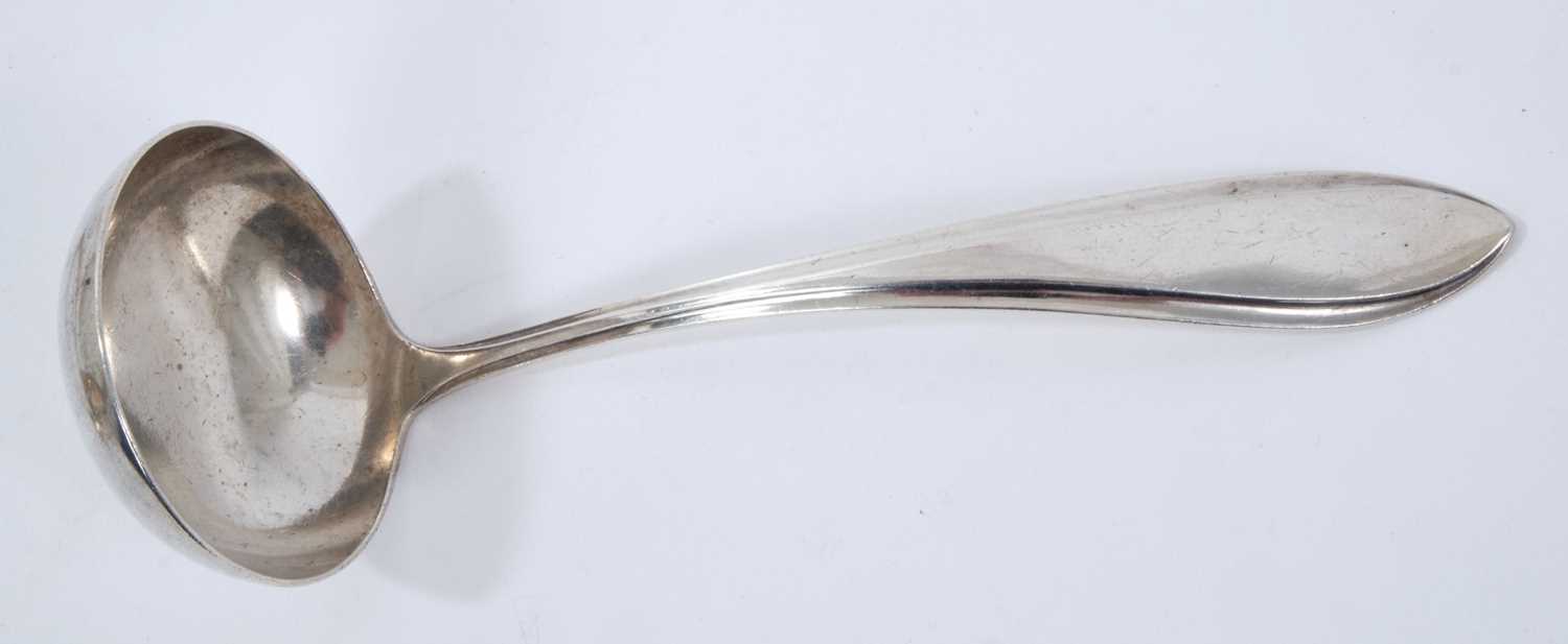 Lot 243 - 1920s Dutch silver sauce ladle with stepped decoration and pointed handle (s'Gravenhage 1922).
