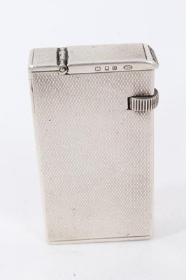 Lot 246 - Late 1930s Dunhill silver petrol cigarette lighter (London 1939) Alfred Dunhill & Sons