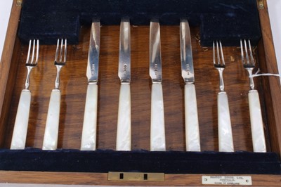 Lot 247 - 1920s dessert set of eights pairs of knives and forks with silver blades and mother of pearl handles