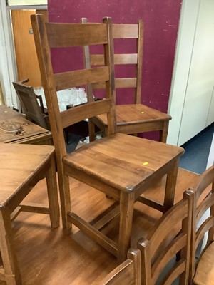 Lot 855 - Contempory Hardwood rectangular dining table and matching set six ladder back dining chairs