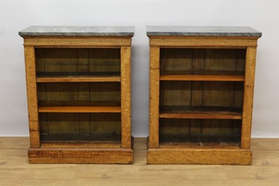 Lot 1421 - Pair of 19th century satinwood open bookcases with grey marble tops and adjustable shelves