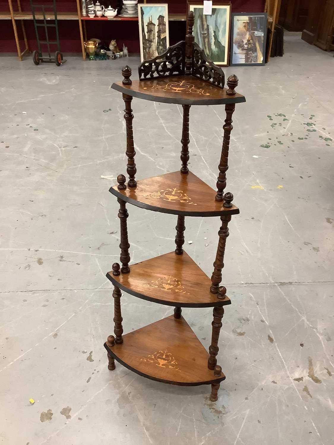 Lot 854 - Victorian inlaid figured walnut veneered four tier bow front whatnot with pierced fretwork and spiral fluted turned supports