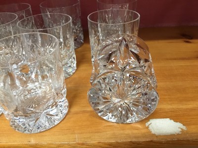 Lot 244 - Set of twelve vintage cut glass whisky tumblers, pair of Victorian cut and etched glass champagne coupes, pair of cut glass brandy balloons, cut glass ships decanter and three other cut glass decan...