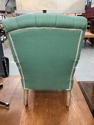 Lot 851 - Victorian armchair upholstered in buttoned green material with turned beech legs on brass castors