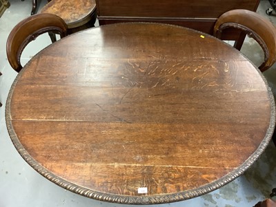 Lot 1040 - Late 19th century carved oak oval dining table on turned supports