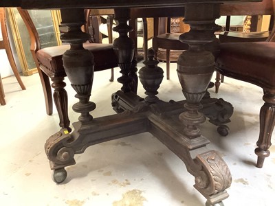 Lot 1040 - Late 19th century carved oak oval dining table on turned supports