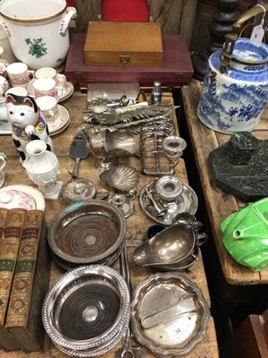 Lot 34 - Mixed lot of silver plate to include wine coasters, toast rack, cutlery sets etc