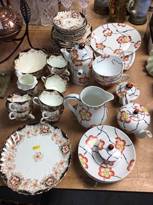 Lot 430 - Early 20th century Limoges two-person tea and coffee set, decorated with flowers, together with a Victorian tea service