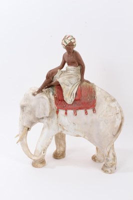 Lot 2353 - Late 19th century plaster model of a boy on an elephant