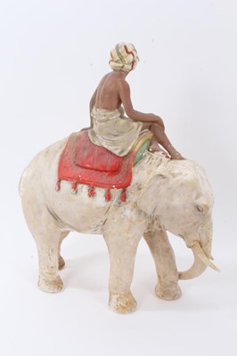 Lot 2353 - Late 19th century plaster model of a boy on an elephant