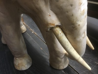 Lot 2353 - Late 19th century plaster model of a boy on an elephant