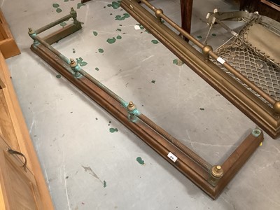 Lot 879 - Metal cot and two Victorian brass fenders (3)