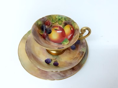 Lot 1143 - Good quality Royal Worcester fruit painted cup and saucer trio