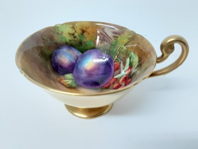 Lot 1144 - Good quality Royal Worcester fruit painted cup and saucer trio