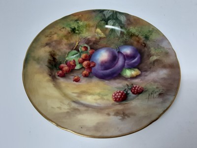 Lot 1144 - Good quality Royal Worcester fruit painted cup and saucer trio