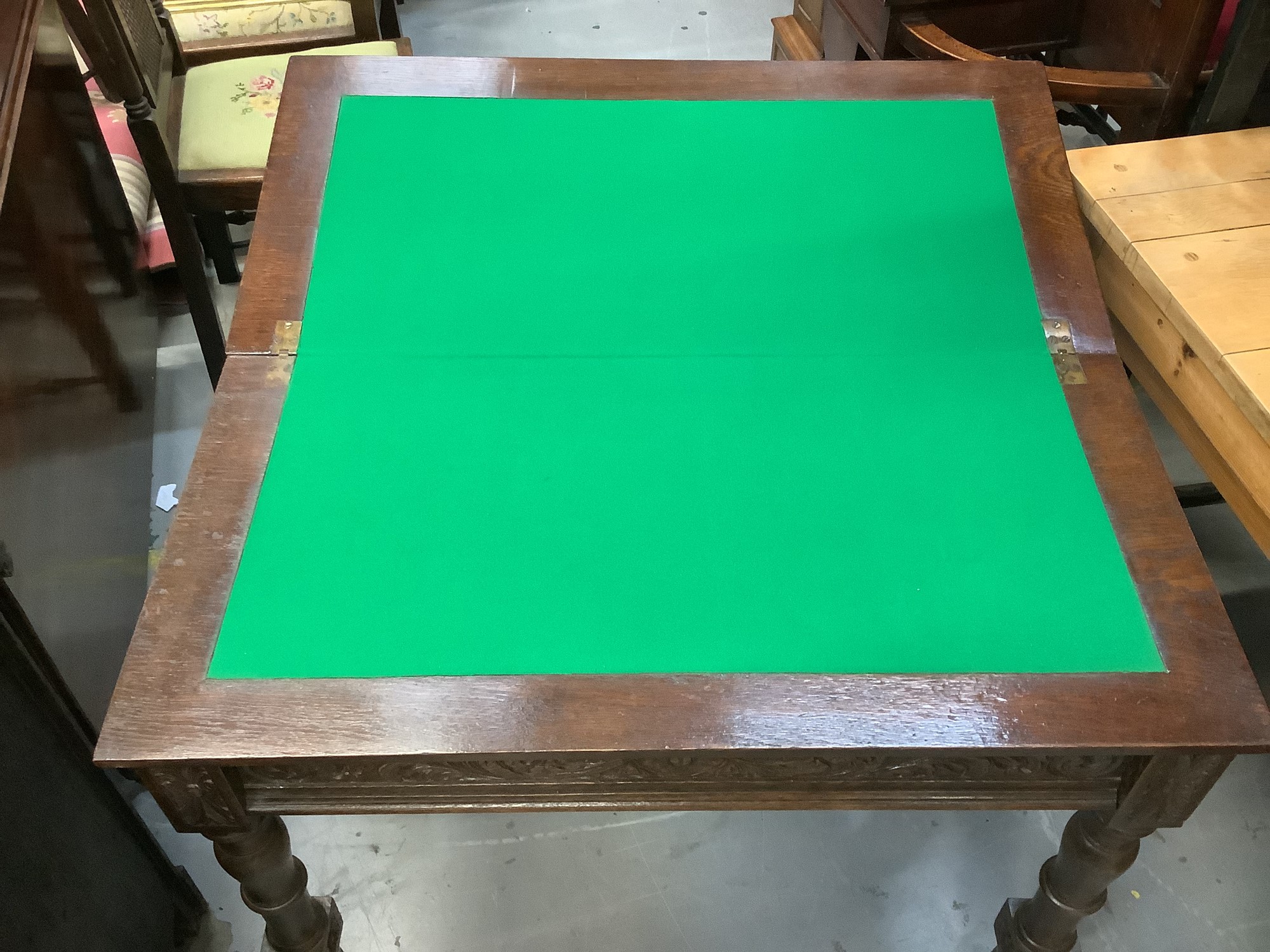 Lot 887 - Edwardian oak rectangular card table with