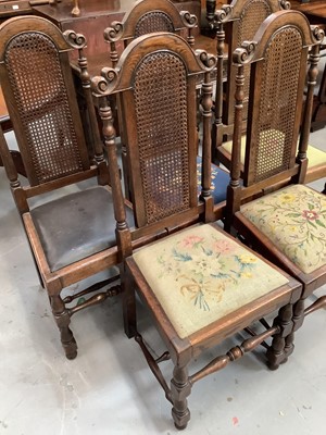 Lot 888 - Set of five oak dining chairs with caned arched backs, four with tapestry seats