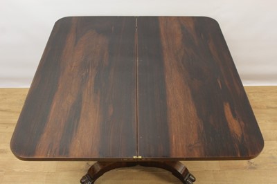 Lot 911 - Victorian rosewood card table on shaped pedestal and quatrefoil base