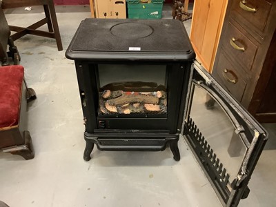 Lot 897 - Modern electric heater in the form of a wood burner