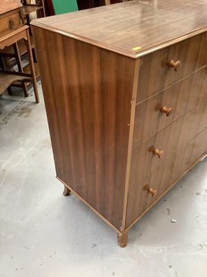 Lot 915 - Vintage Heals chest of four long drawers with turned handles, on shaped feet, together with a Heals dressing table with three drawers (2)