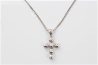 Lot 1581 - White gold (18ct) diamond set cross pendant on...