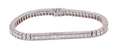 Lot 507 - Diamond tennis bracelet with baguette cut diamonds in 18ct white gold setting, estimated total diamond weight approximately 12 carats