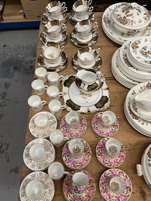 Lot 14 - Tuscan black and gilt teaset (38 pieces), T. Goode & Co coffee set and a Coalport coffee set