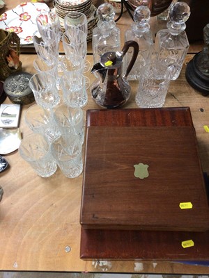 Lot 410 - Quantity of glassware, two cases of cutlery, plated jug, and three books on Ireland