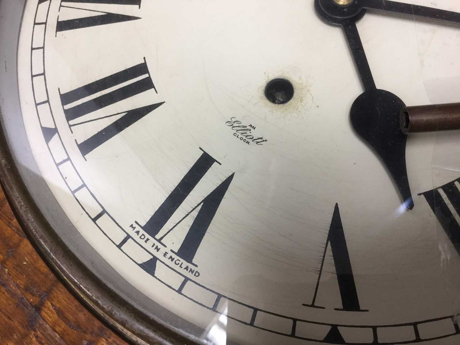 Lot 261 Mid 20th century Elliot wall clock in oak